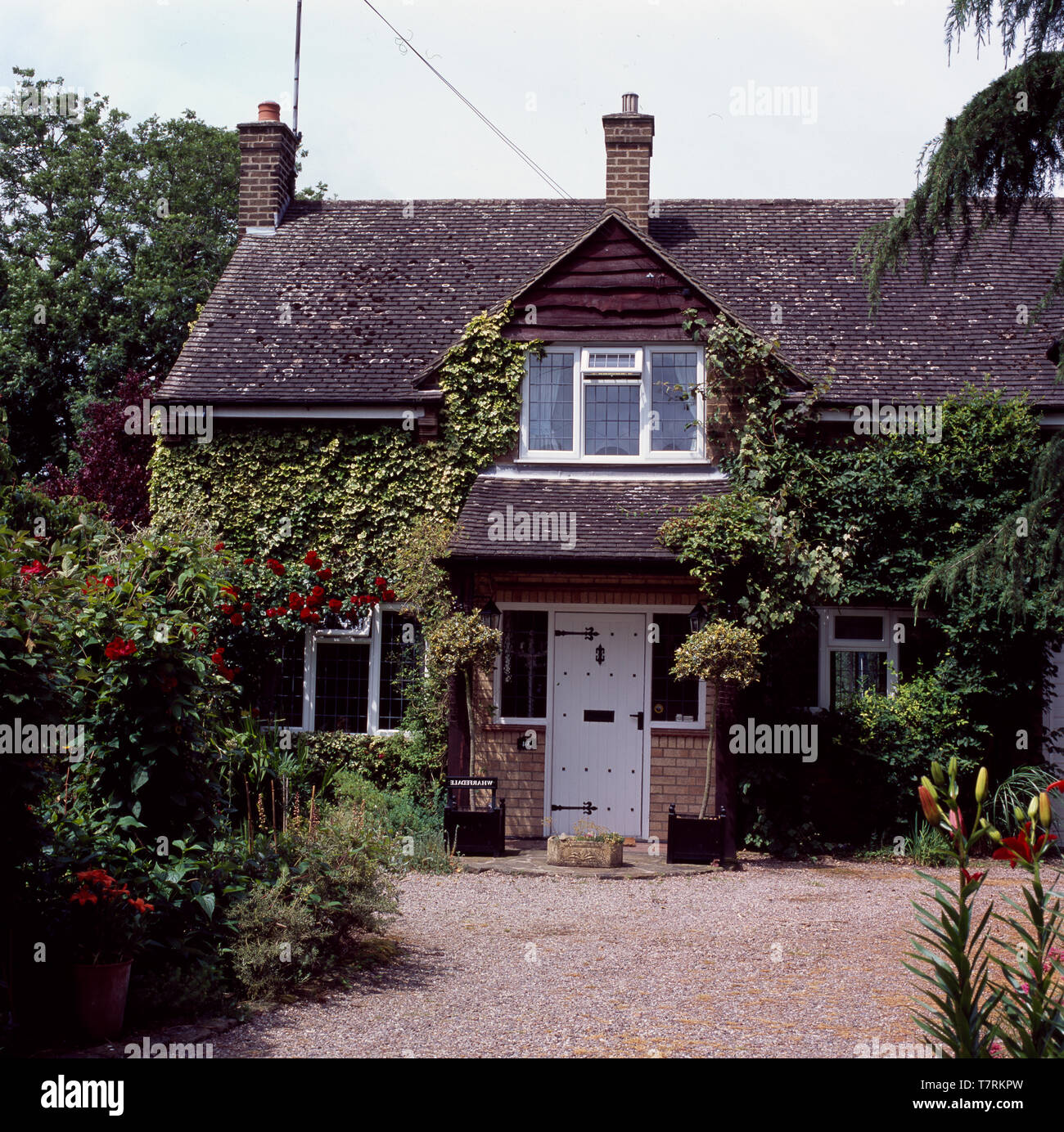 Exterior Of Cottage With Dormer Window Above Front Door