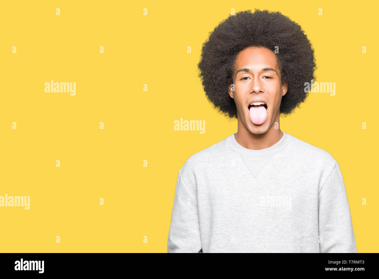 Young African American Man With Afro Hair Wearing Sporty