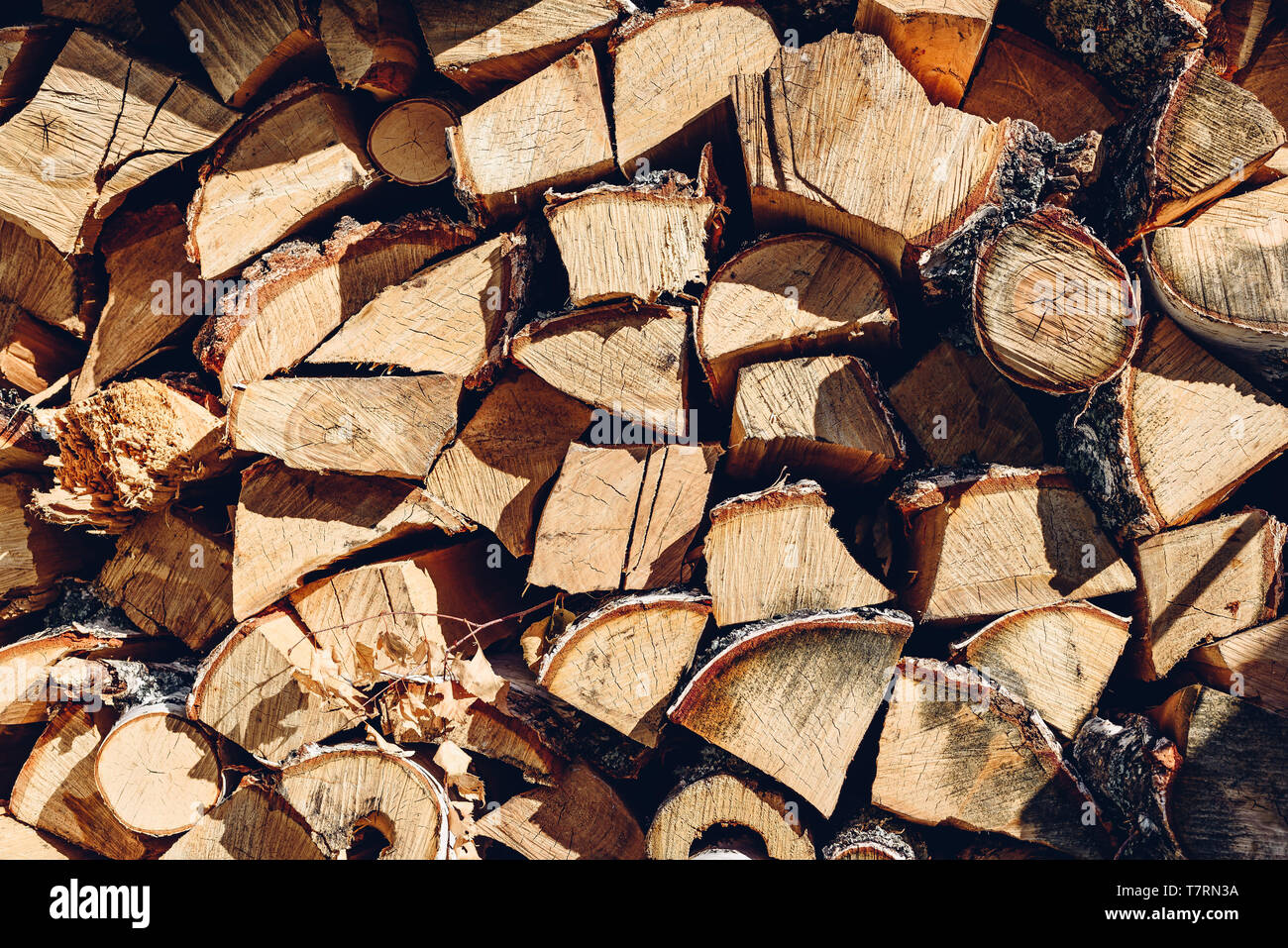 Background of a stack pile of chopped wood Stock Photo - Alamy