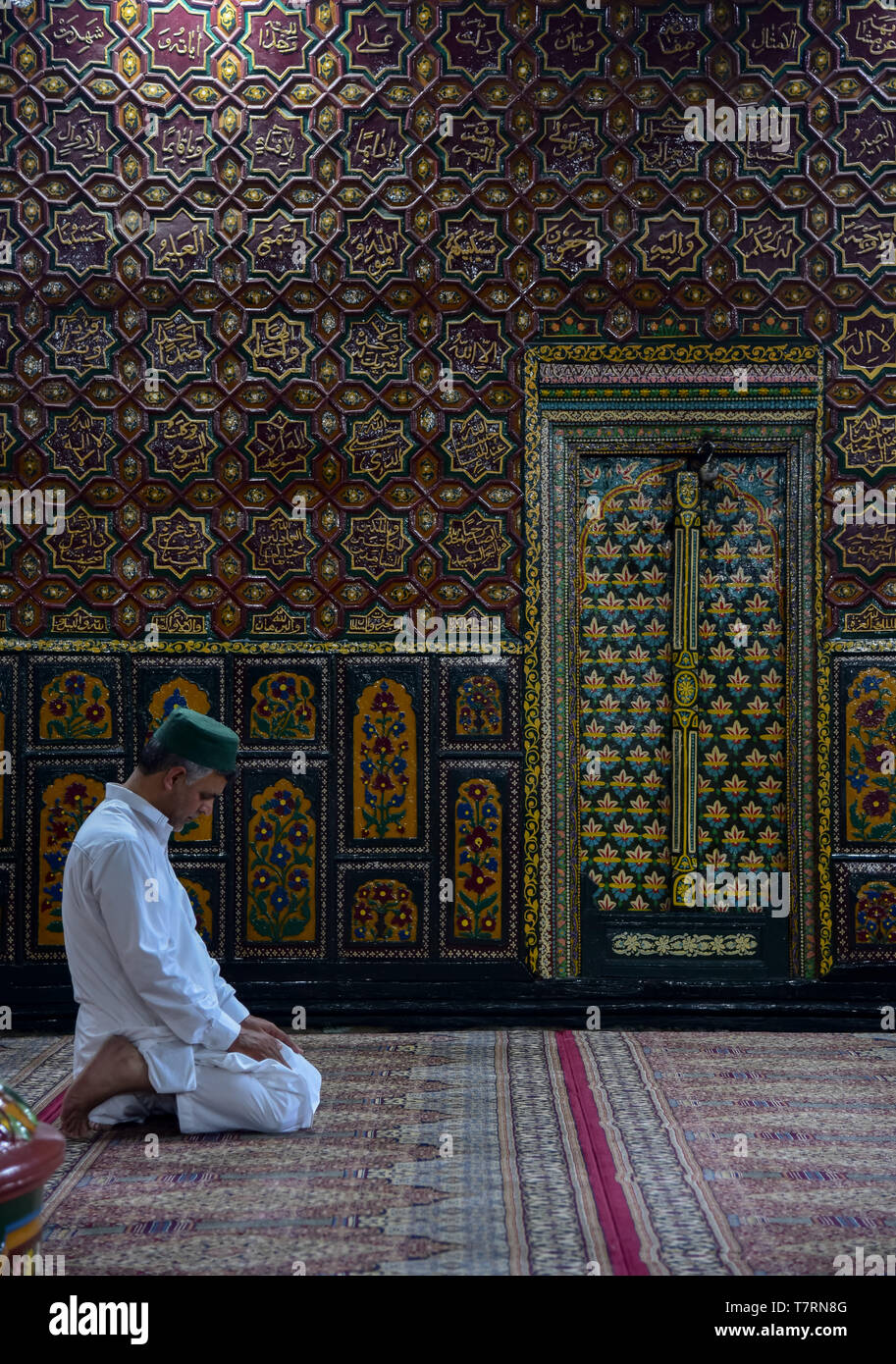 A Kashmiri man seen Praying inside a shrine on the second day of the ...