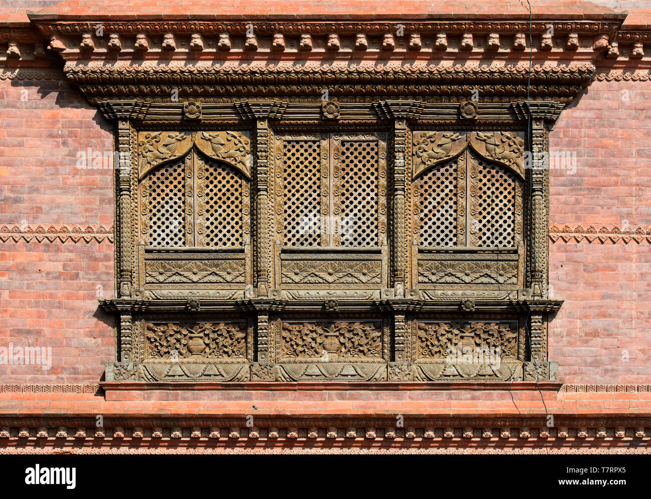 Elaborately carved wooden windows in the traditional Newar style, Kathmandu, Nepal Stock Photo