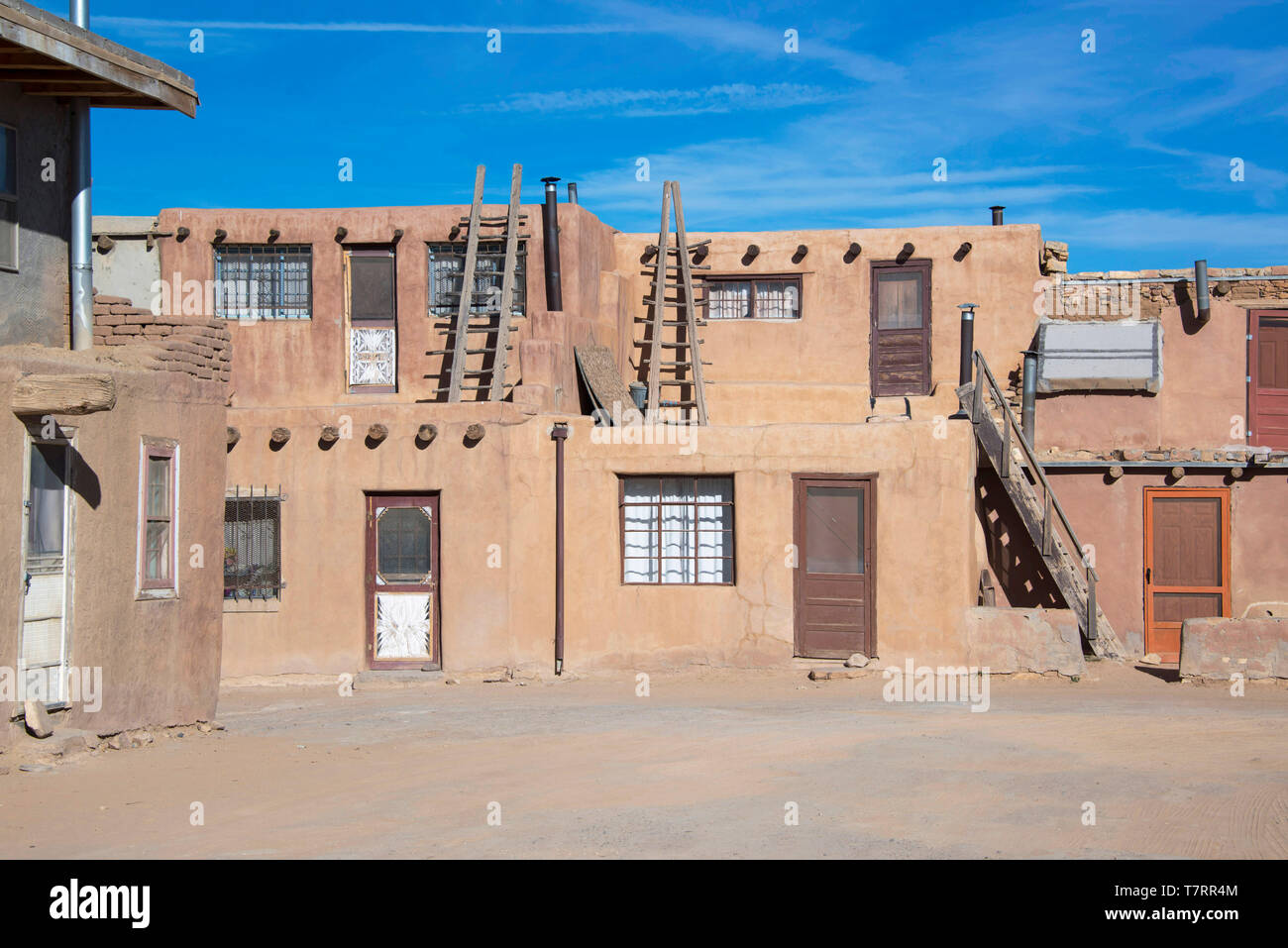 Acoma Pueblo historic adobe homes, doors and wooden ladders at Sky City in New Mexico, USA Stock Photo