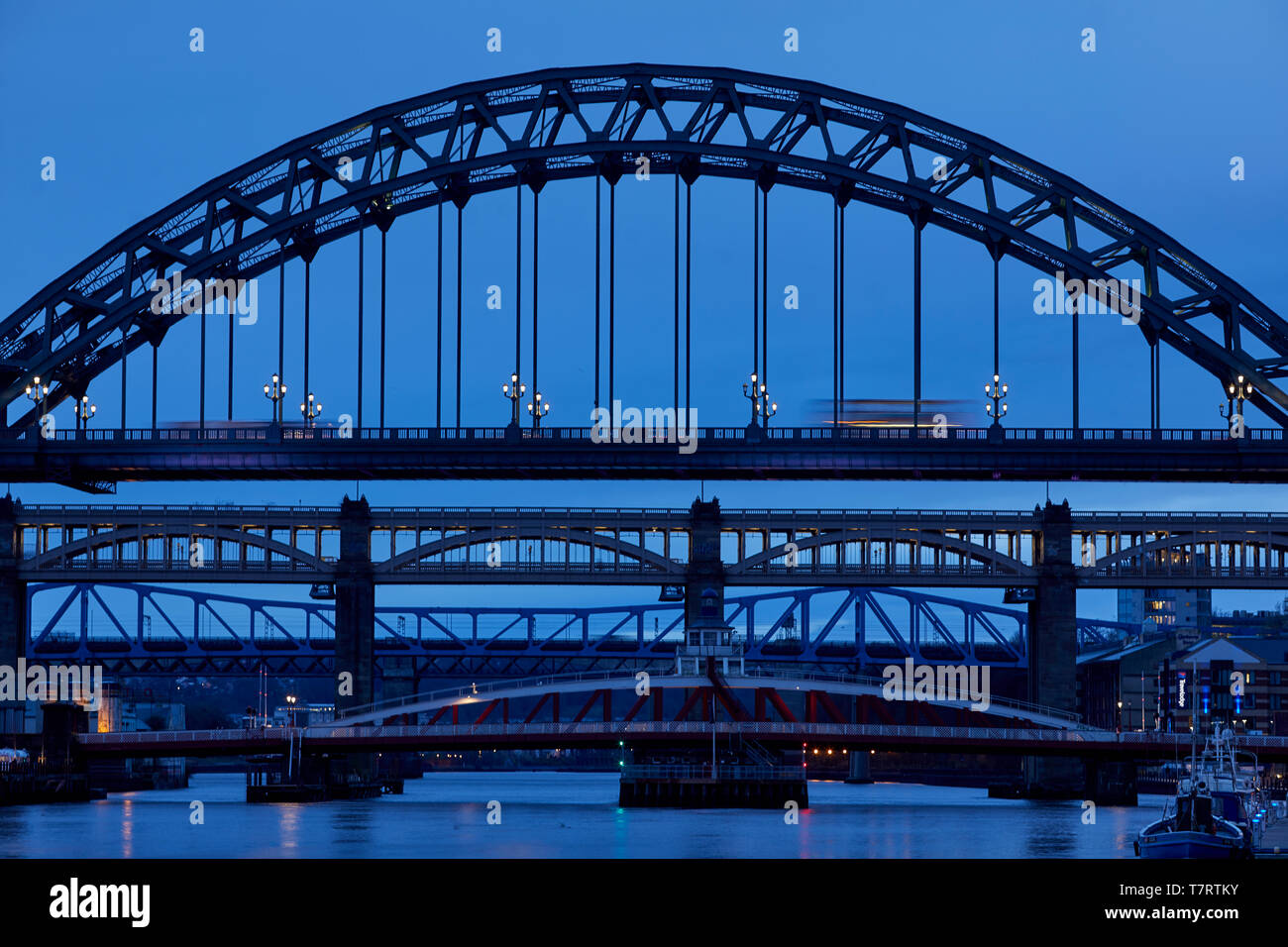 Iconic Newcastle upon Tyne  Quayside waterfront  landmark Tyne Bridge, Swing Bridge, High Level bridge and beyond is King Edward VII Bridge Stock Photo