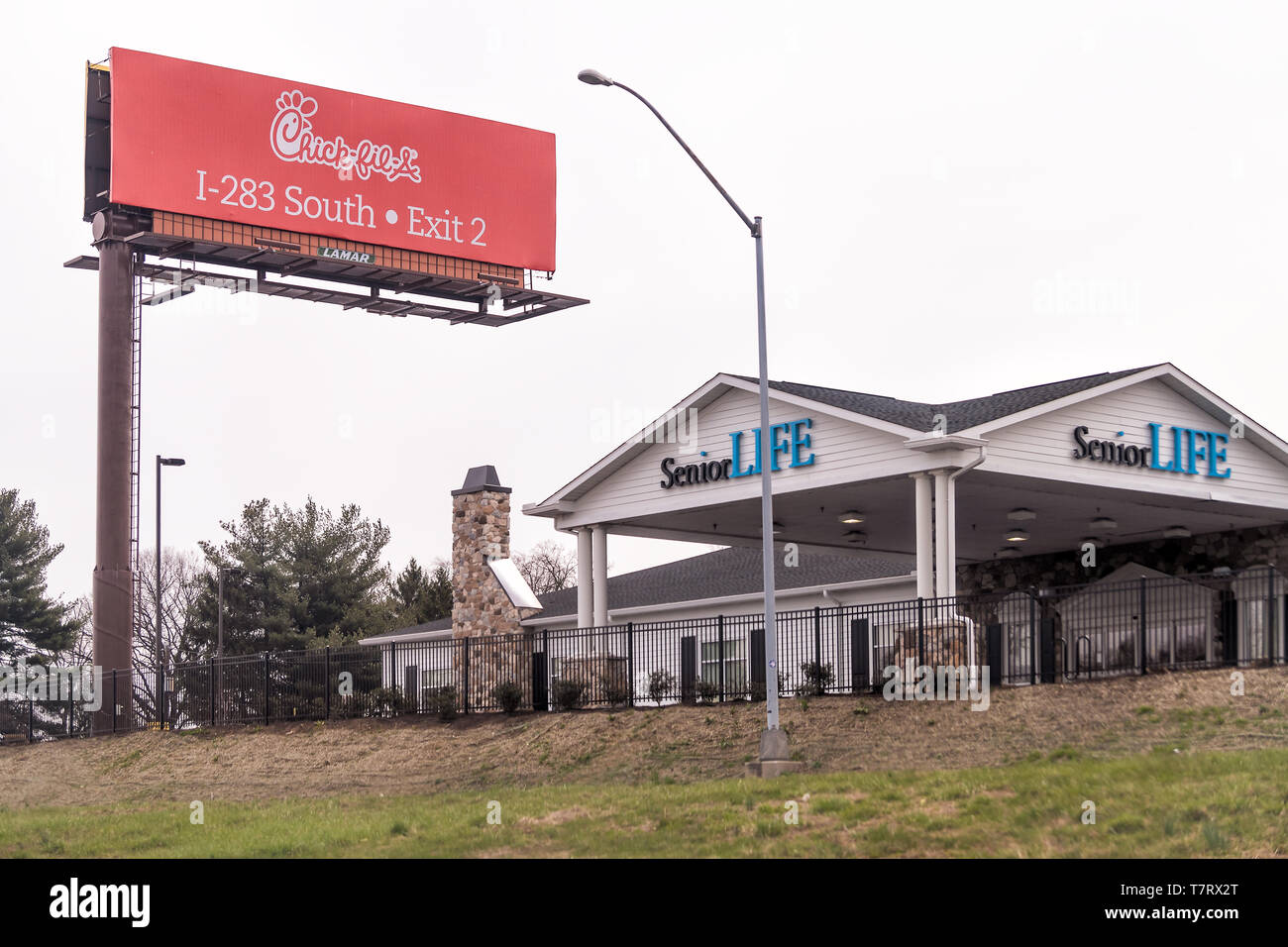 Harrisburg, USA - April 6, 2018: Chick-fil-a red sign on highway 83 in Pennsylvania with i283 south exit Stock Photo