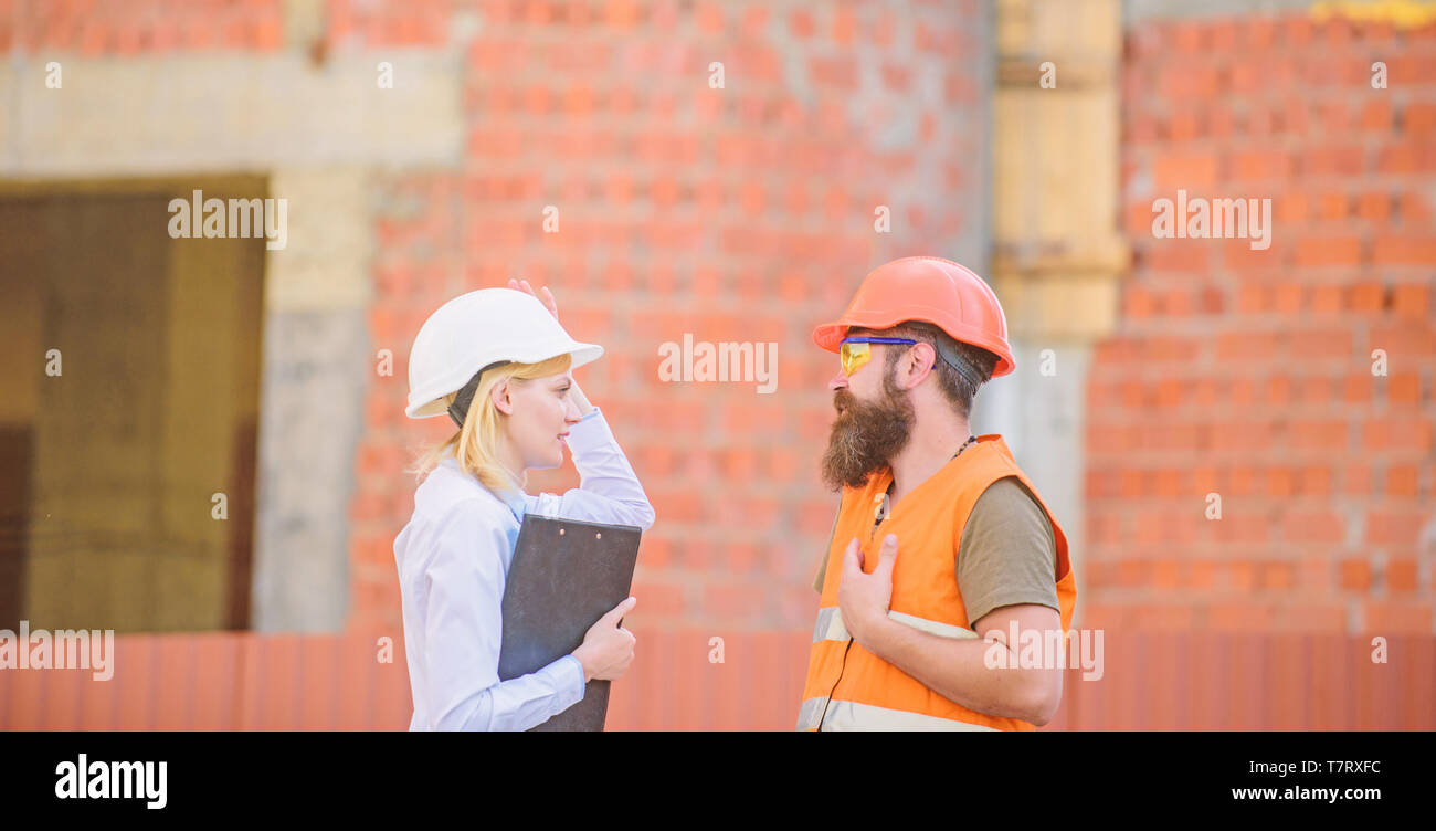 Construction site safety inspection. Discuss progress project ...