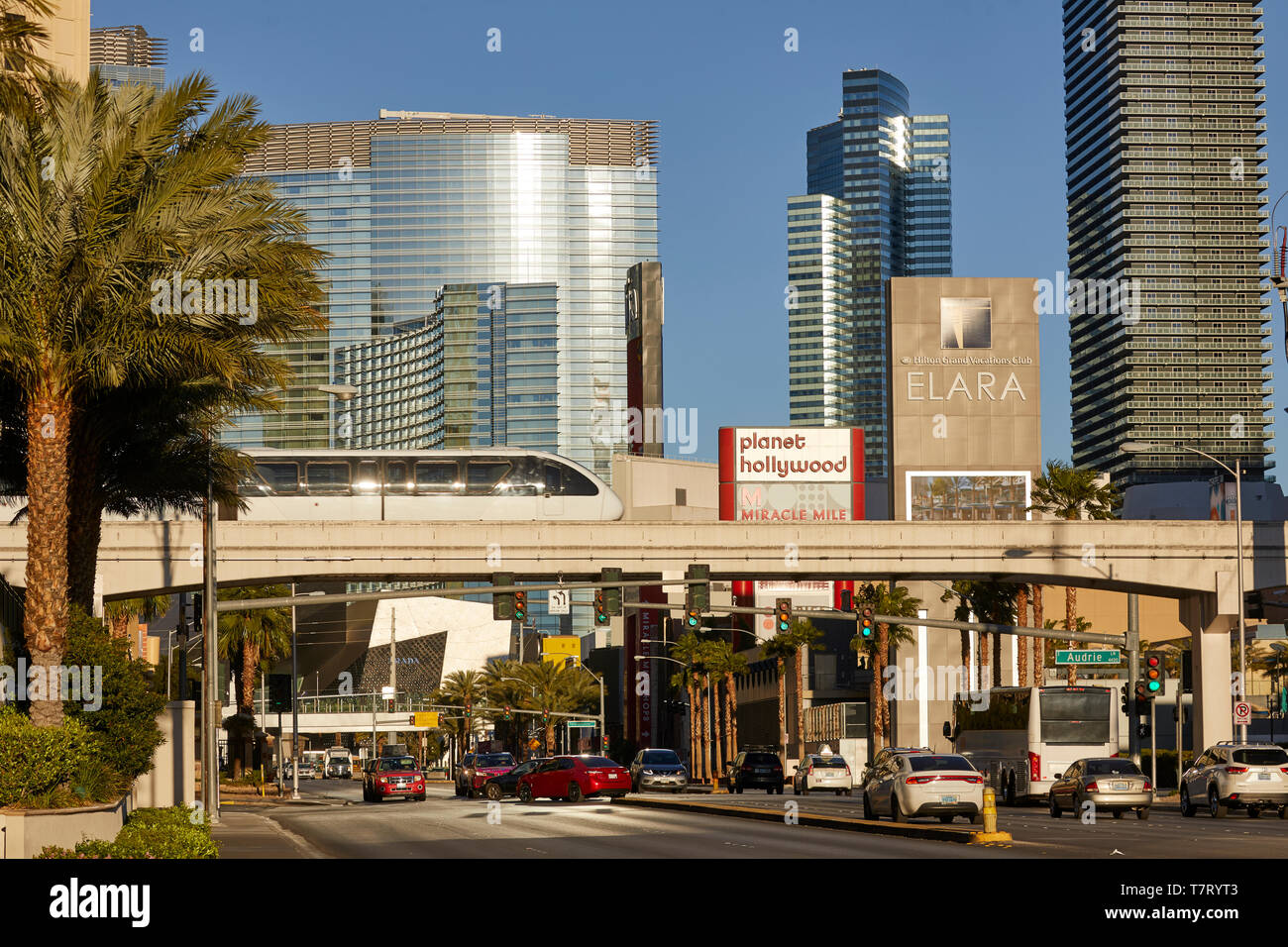 Las Vegas, Paradise, Nevada USA, skyline of the strip, Driverless straddle beam Innovia Monorail crossing  E Harmon Avenue Stock Photo