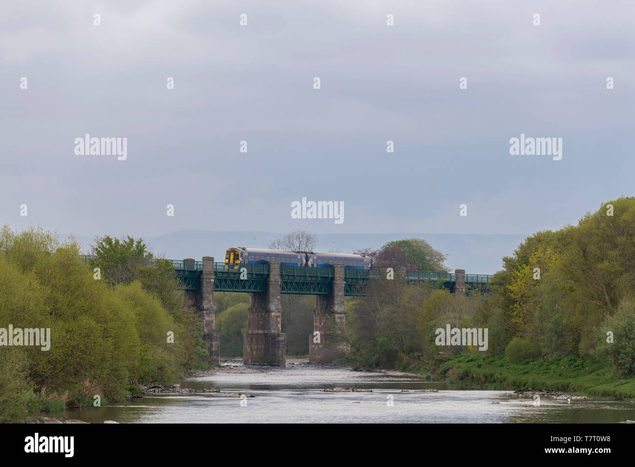 A Scotrail Commuter Train (Class 158 'Express' DMU) Crossing the River North Esk on the Marykirk Viaduct Stock Photo