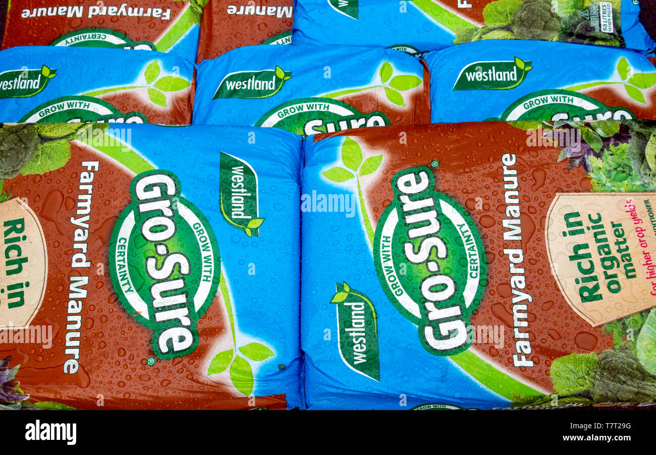 A stack of bags of Farmyard Manure improving soil quality and promoting