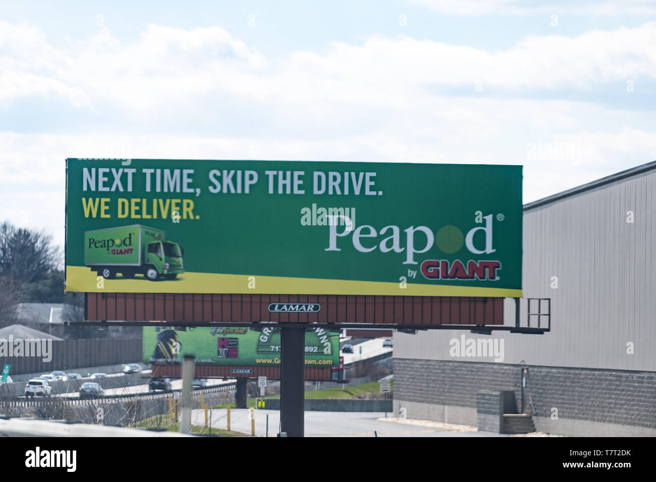 Harrisburg, USA - April 8, 2018: Billboard advertisement advertising Peapod by Giant grocery delivery by truck to home in Pennsylvania Stock Photo
