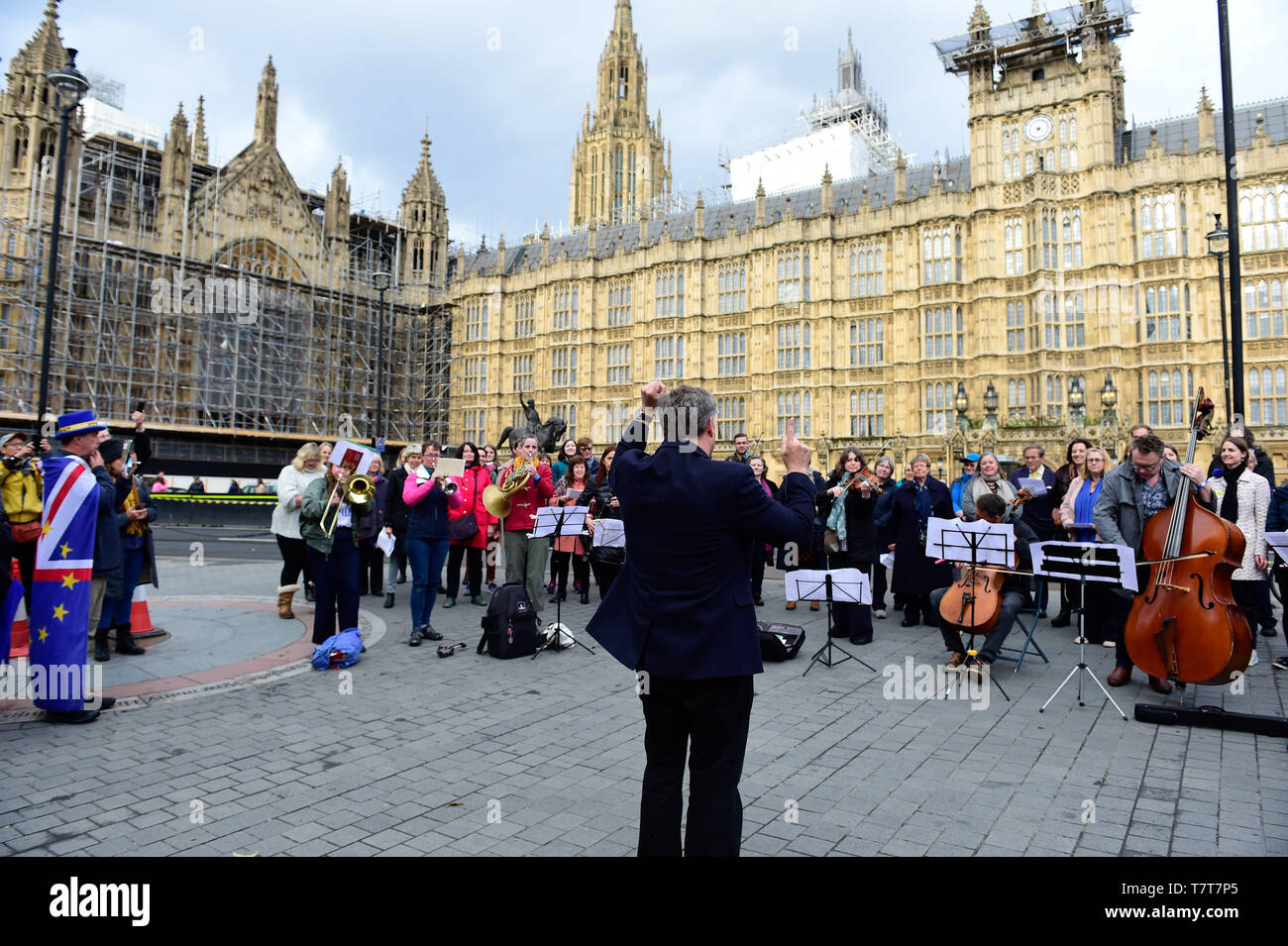 London, UK. 8th  May, 2019. Dash Arts, anti-Brexit European Flash Mob, Outside Westminster Abbey, performing a 5 minute extract from Bethoven’s 9th (Ode to Joy) celebrating the enduring links between UK and Europe Credit: Van Quan/Alamy Live News Stock Photo