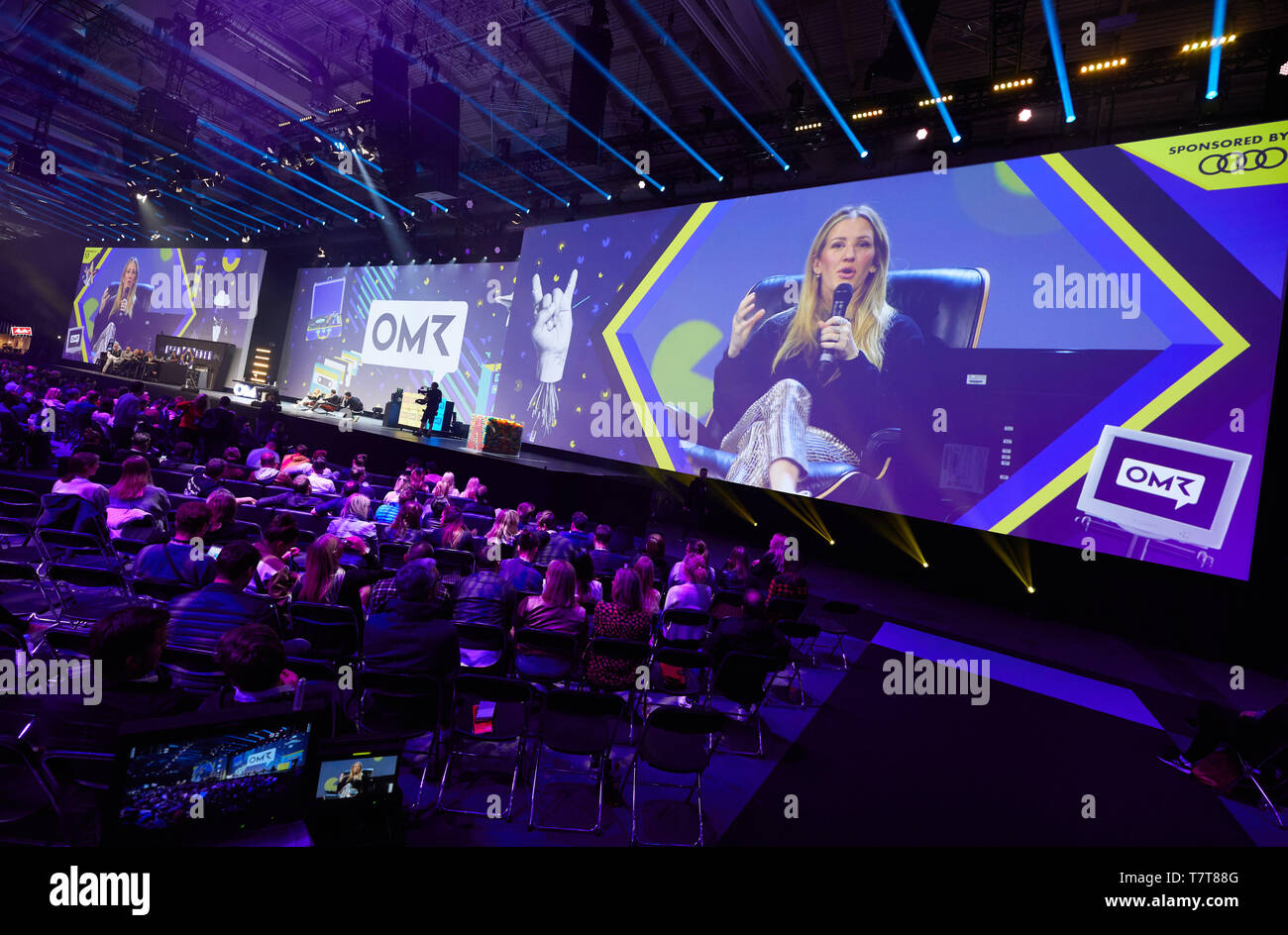 Hamburg, Germany. 08th May, 2019. Ellie Goulding, British singer-songwriter, and Philipp Westermeyer, co-founder of OMR, speak on a stage at the marketing trade fair 'Online Marketing Rockstars' (OMR) in the exhibition halls. Credit: Georg Wendt/dpa/Alamy Live News Stock Photo