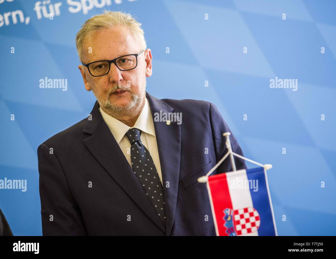 Munich, Bavaria, Germany. 9th May, 2019. Croatian Interior Minister DAVOR BOZINOVIC (Davor BoÅ¾inoviÄ‡) visited his Bavarian counterpart JOACHIM HERRMANN in Munich to discuss such themes as migration, the external European Union borders, entrance of Croatia into the Schengen Area, and the 2020 EU Council presidency which will be taken over by Croatia. Minister Bozinovic addressed allegations by NGOs that Croatian police are committing illegal pushbacks of refugees and migrants back into Bosnia, with the police illegally entering Bosnia. The Minister has said he is aware of the allegations an Stock Photo
