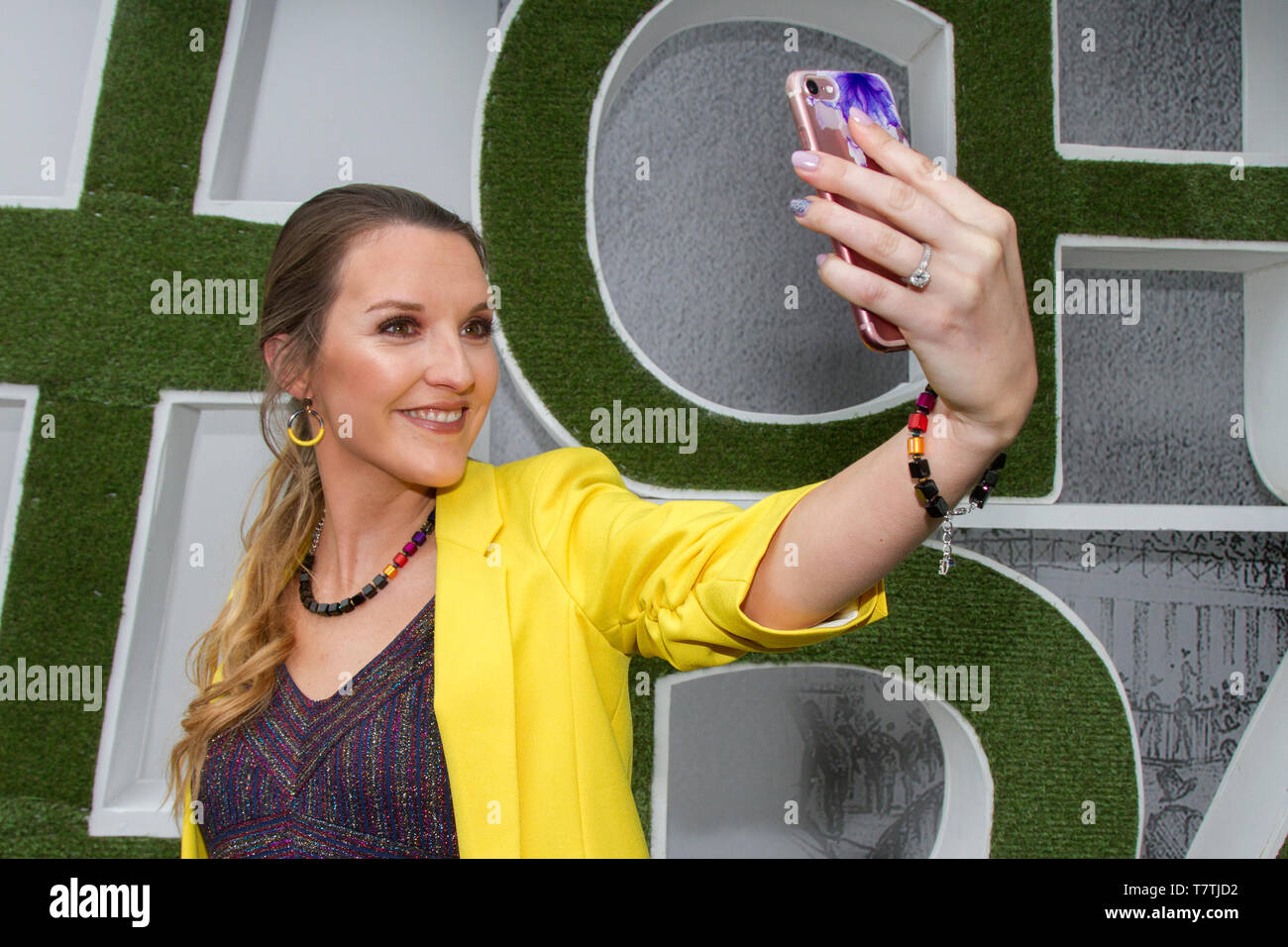 Chester, UK. 9th May, 2019 Samantha from Southport at Boodles May Festival. The famous horse racing event welcomes fashionistas & street style people on this very special parade of the finest expensive female fashions. Glamorous racegoers women in fancy outfits, ladies in figure-hugging suits, floral dresses, lovely, charming, elegant, splendid, impressive, magnificent, prestigious fashionable frocks, plush opulent, ritzy patrons, lovely, charming, elegant, splendid hats, headbands & fashion finery wearing high end couture attend Chester Races. Credit. MWI/AlamyLiveNews Stock Photo