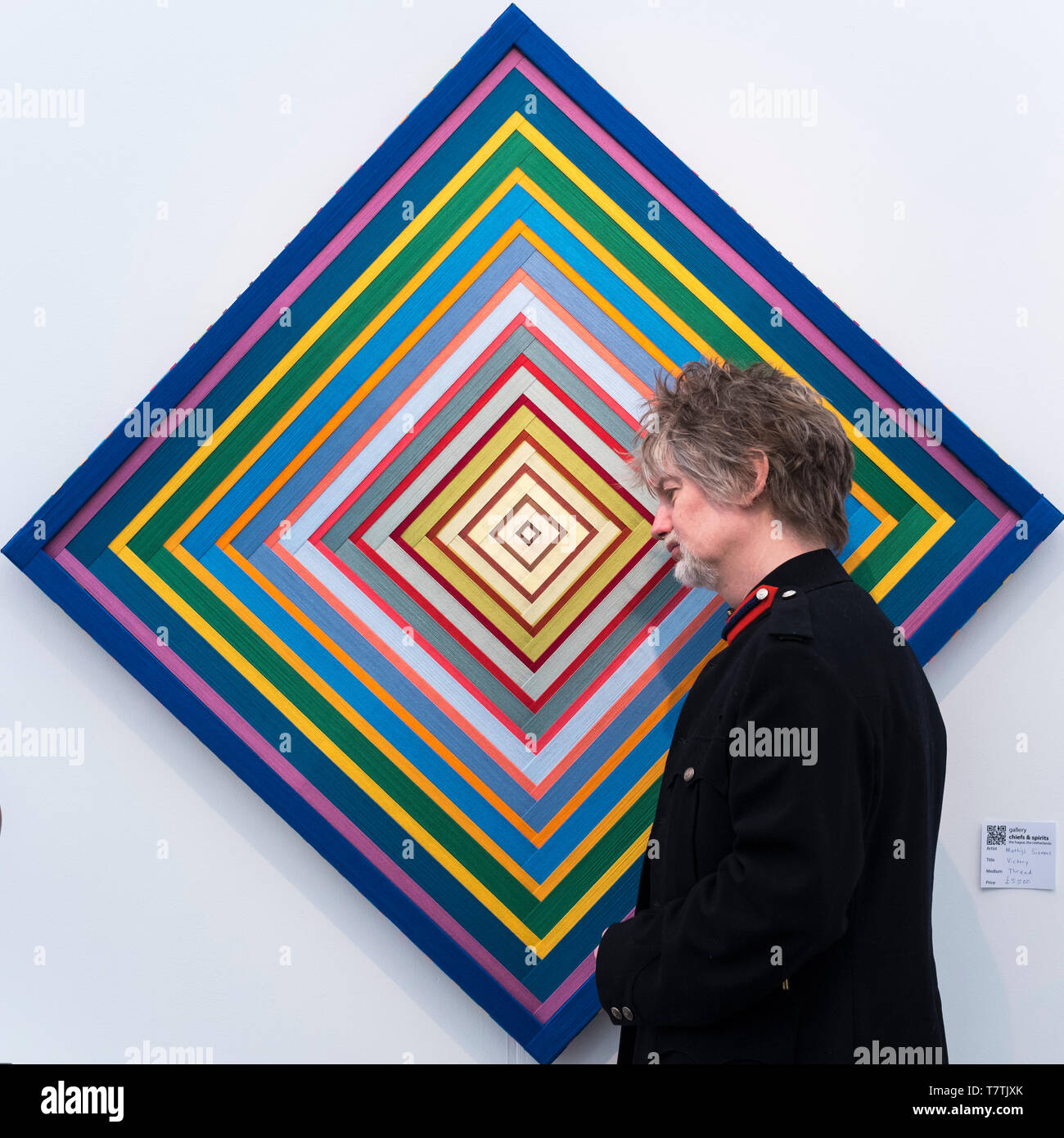 London, UK.  9 May 2019. A visitor views 'Victory' by Mathijs Siemens at the Chiefs and Spirits gallery on the opening day of the Affordable Art Fair in Hampstead Heath.  The show runs until May 12 and features works of art for all tastes from over 100 international galleries at prices ranging from GBP100 to GBP6,000. Credit: Stephen Chung / Alamy Live News Stock Photo