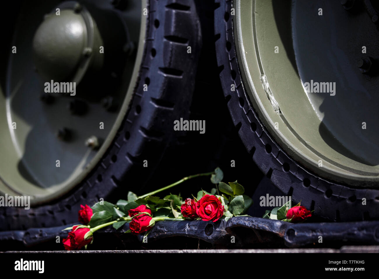 Berlin, Germany. 09th May, 2019. Roses lie on the chain of a historical tank at the Soviet Memorial at the Tiergarten on the occasion of the 74th anniversary of Russia's victory in the Second World War. Russia celebrates the end of the war on 9 May, one day later than the West, because in 1945 the German surrender to the Soviet troops took place on the night of 8 to 9 May, at a time when midnight was over in Moscow. Credit: Carsten Koall/dpa/Alamy Live News Stock Photo