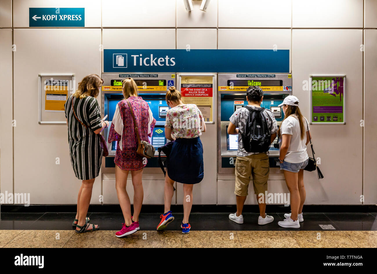Tourists Buying Tickets At An MRT Station, Singapore, South East Asia Stock Photo