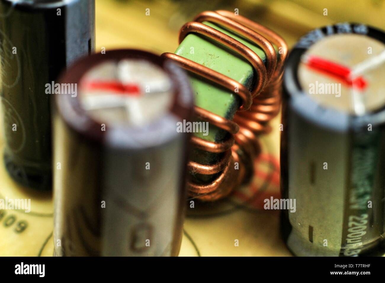 Macro photography of coil, capacitors and other