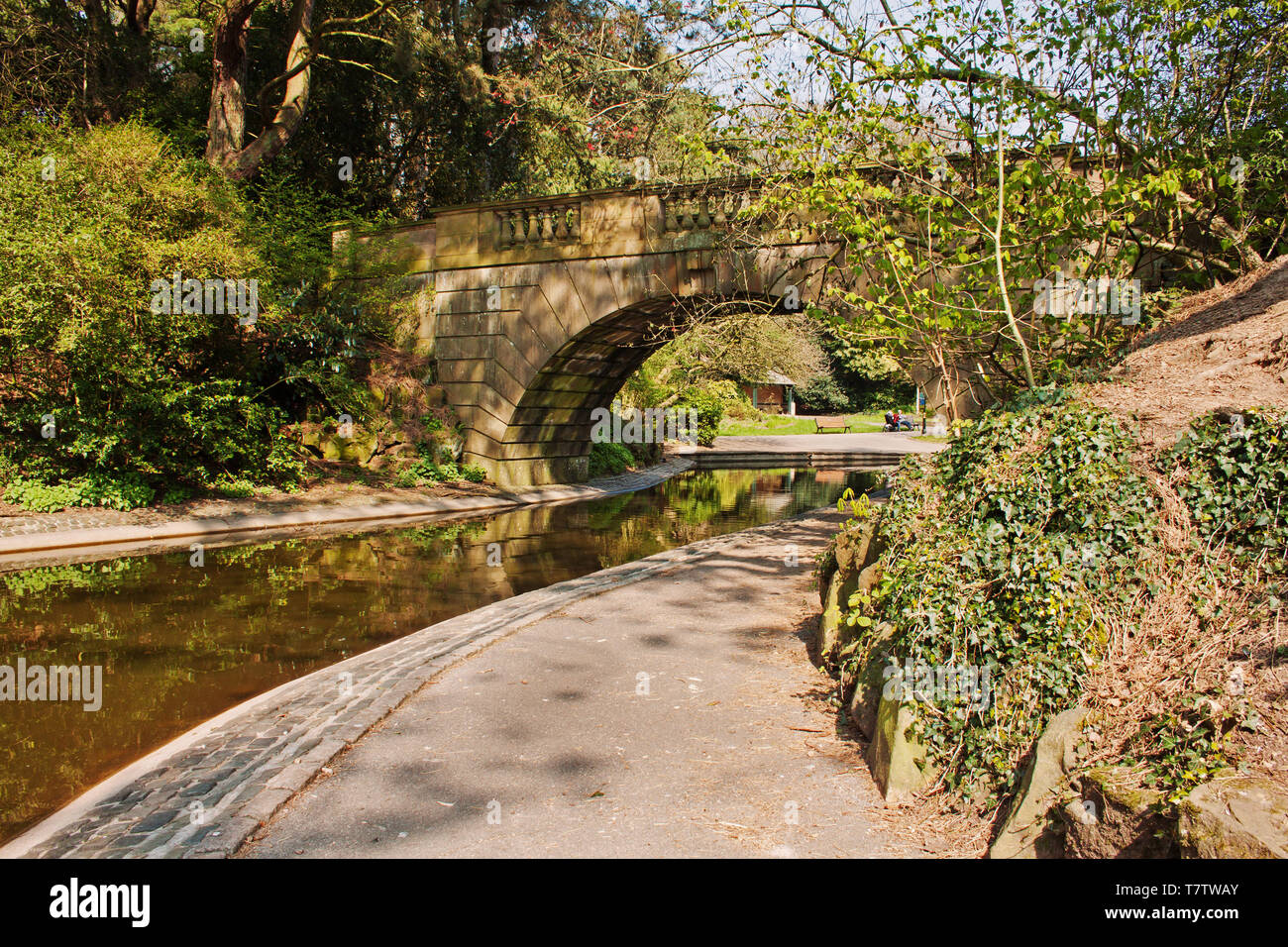 The curved path by the lake in Williamson Park, Lancaster Stock Photo