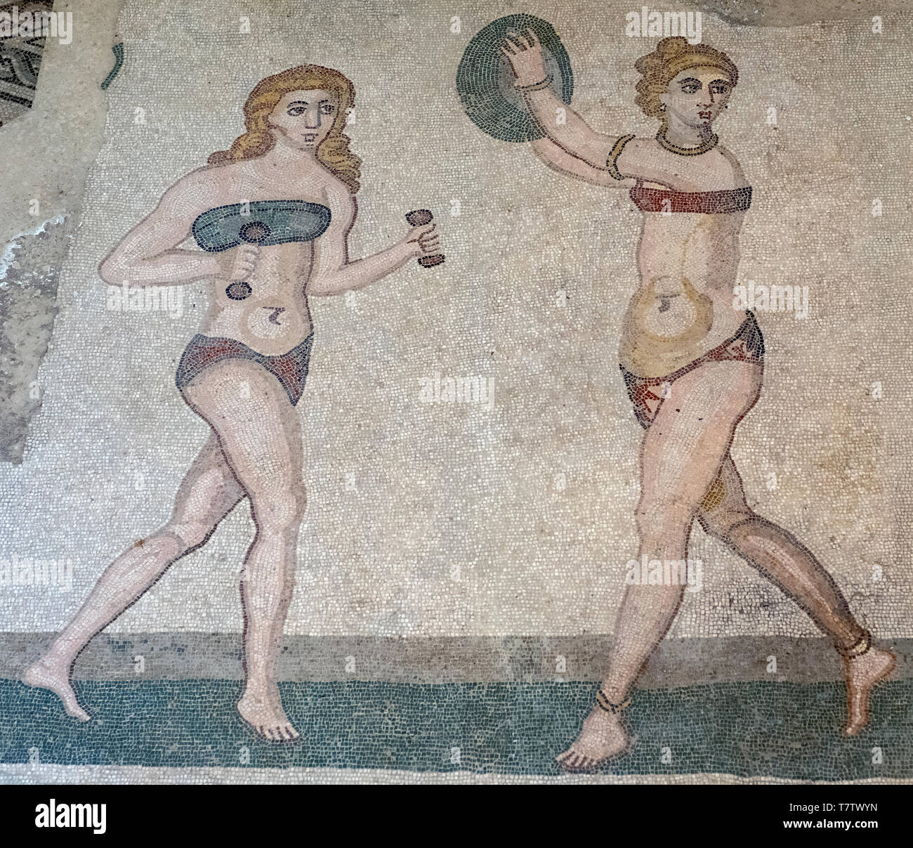 The bikini girls mosaic, showing athletic women playing sports, roman  mosaic in the Villa Romana del Casale, Piazza Armerina, Sicily, Italy Stock  Photo - Alamy