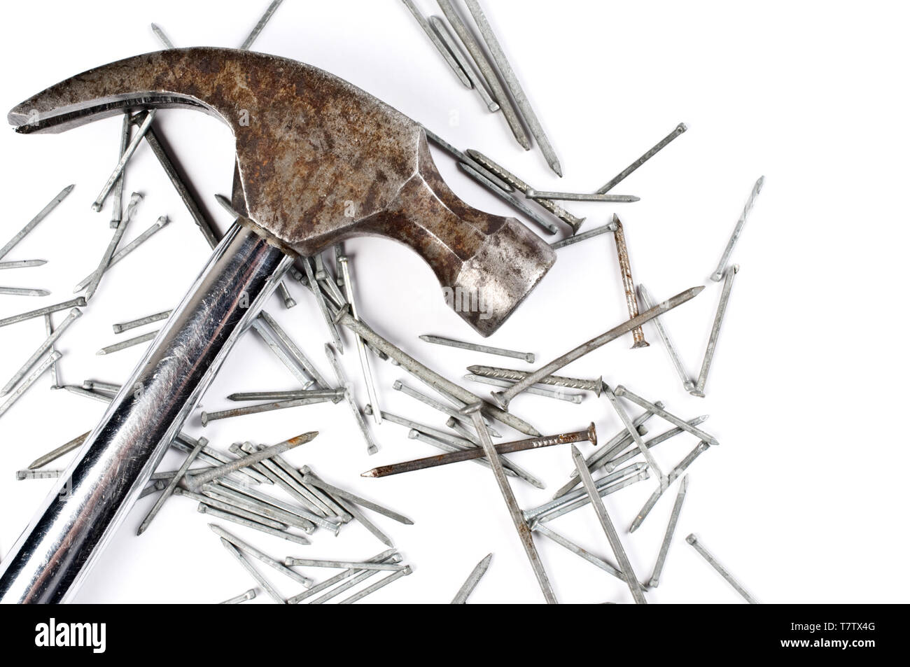 Claw hammer and nails on white background Stock Photo - Alamy