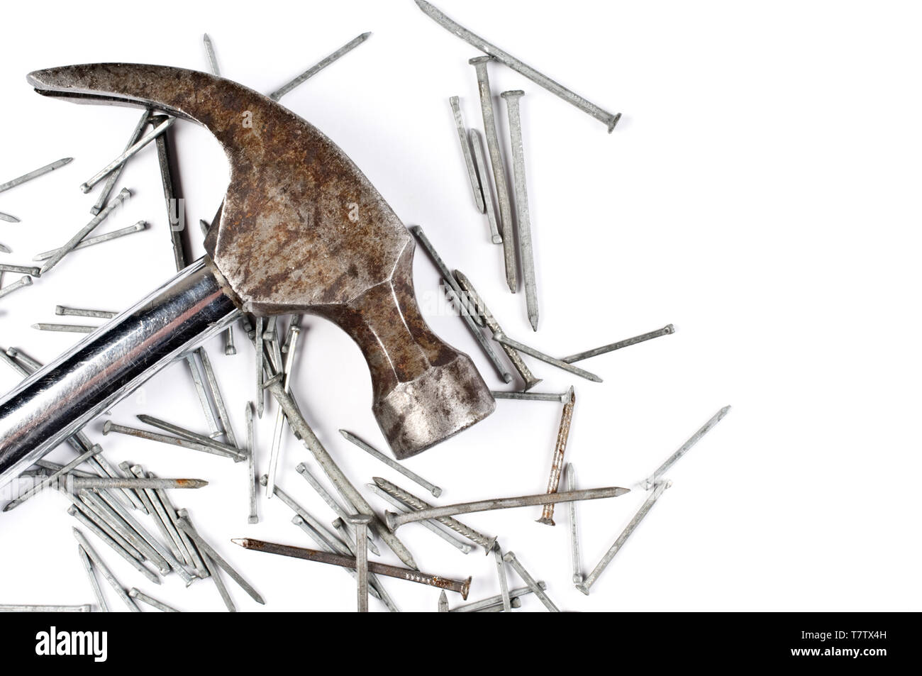 Claw hammer and nails on white background Stock Photo - Alamy