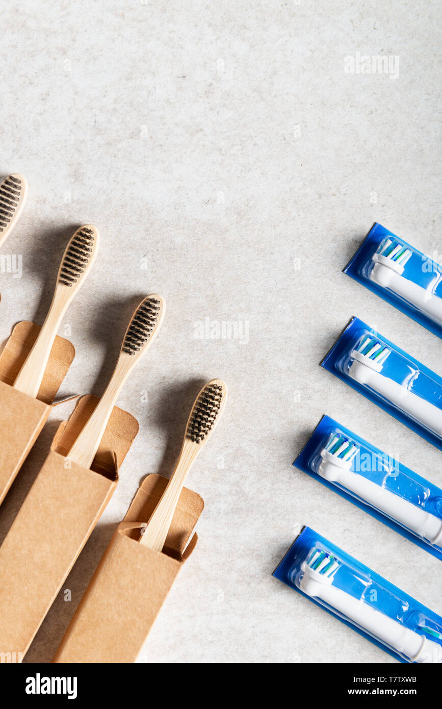 Plastic toothbrush heads vs bamboo toothbrushes Stock Photo Alamy