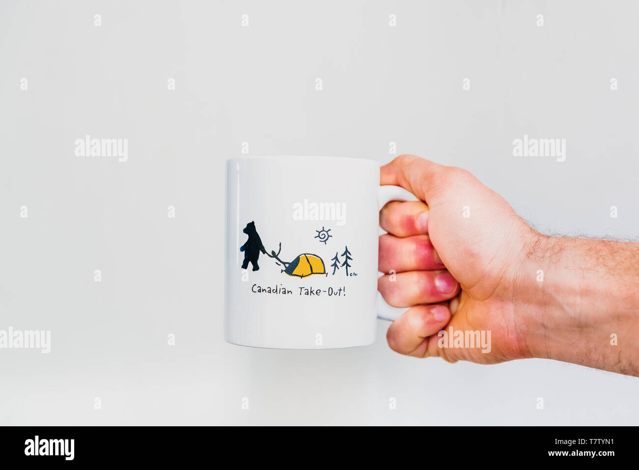 Vancouver, Canada May 1, 2019 Souvenir mug of a trip to Canada, with a funny design with