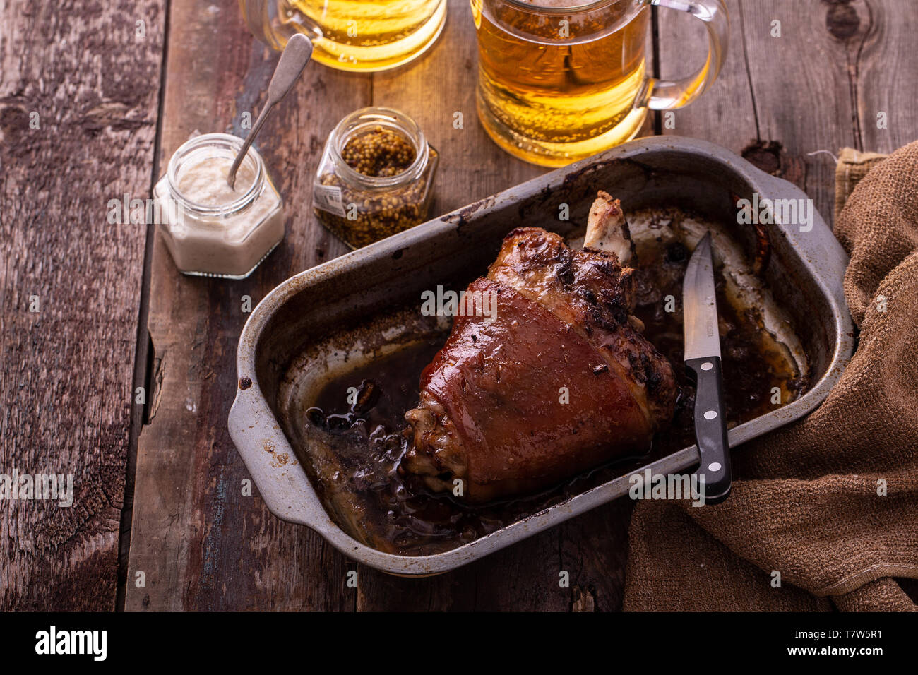 Honey glazed pork knuckle with beer. copy space Stock Photo Alamy