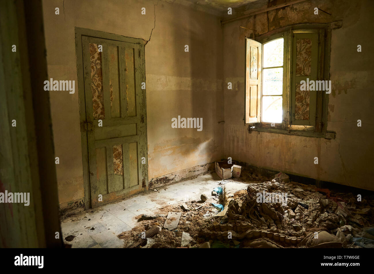 Interior of a room of the ruined facilities at the abandoned Canfranc International railway station (Canfranc, Pyrenees, Huesca, Aragon, Spain) Stock Photo