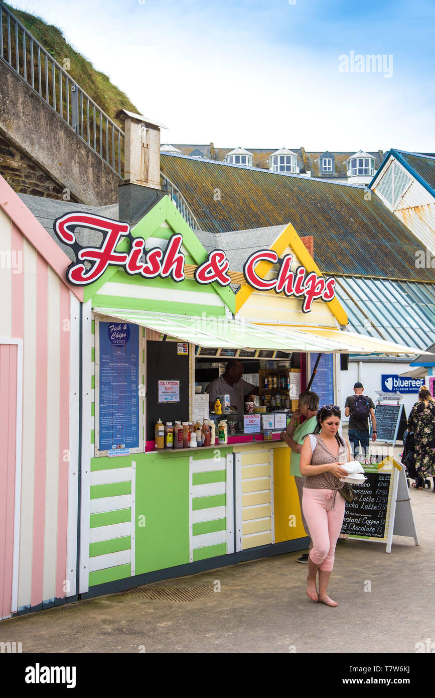 Fish and Chips served to holidaymakers on the seafront at Towan Beach