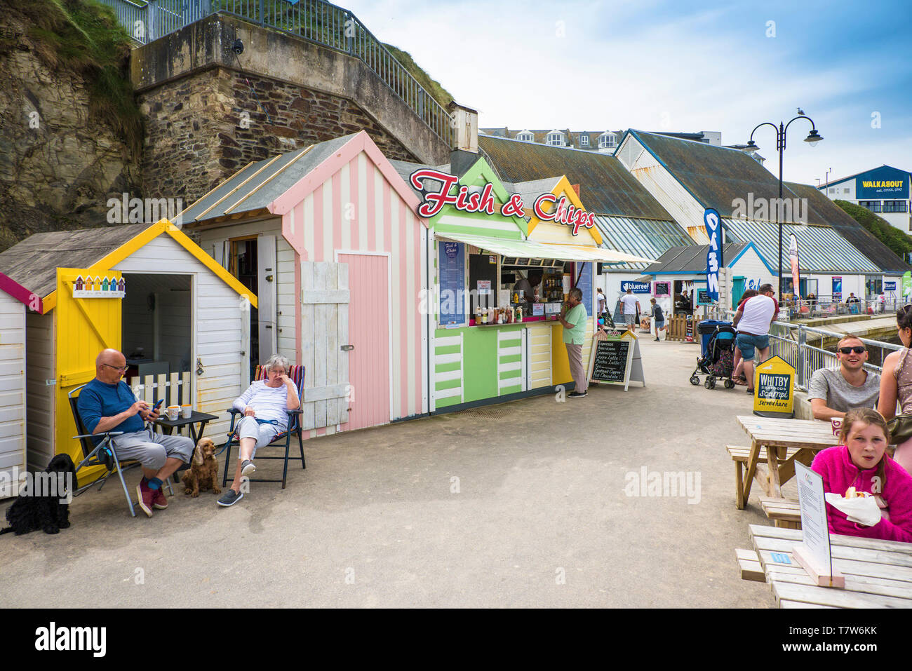 Fish and Chips served to holidaymakers on the seafront at Towan Beach
