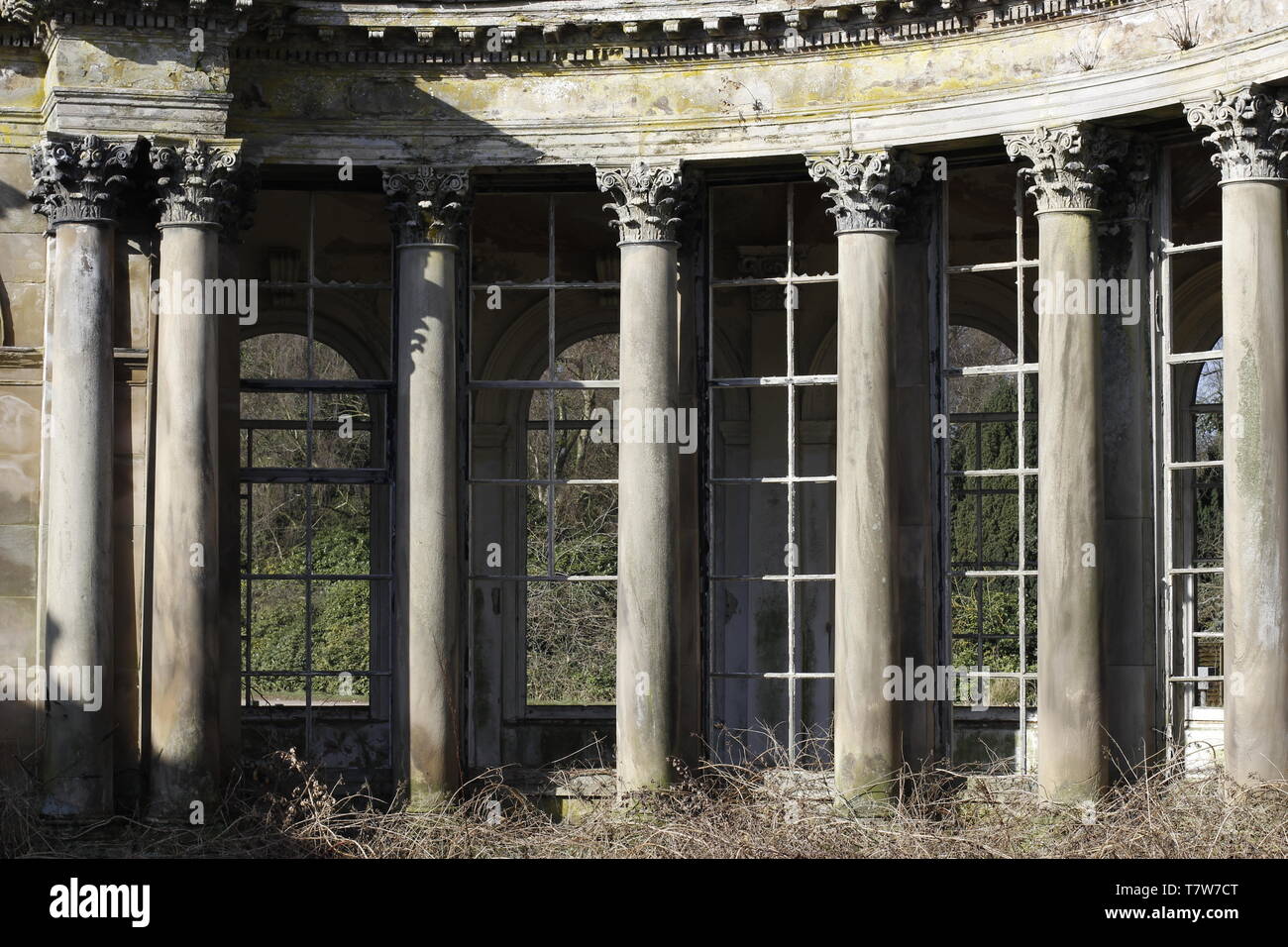 colour images showing detail of abandoned classic buildings including window frames, stone columns, decoration etc Stock Photo