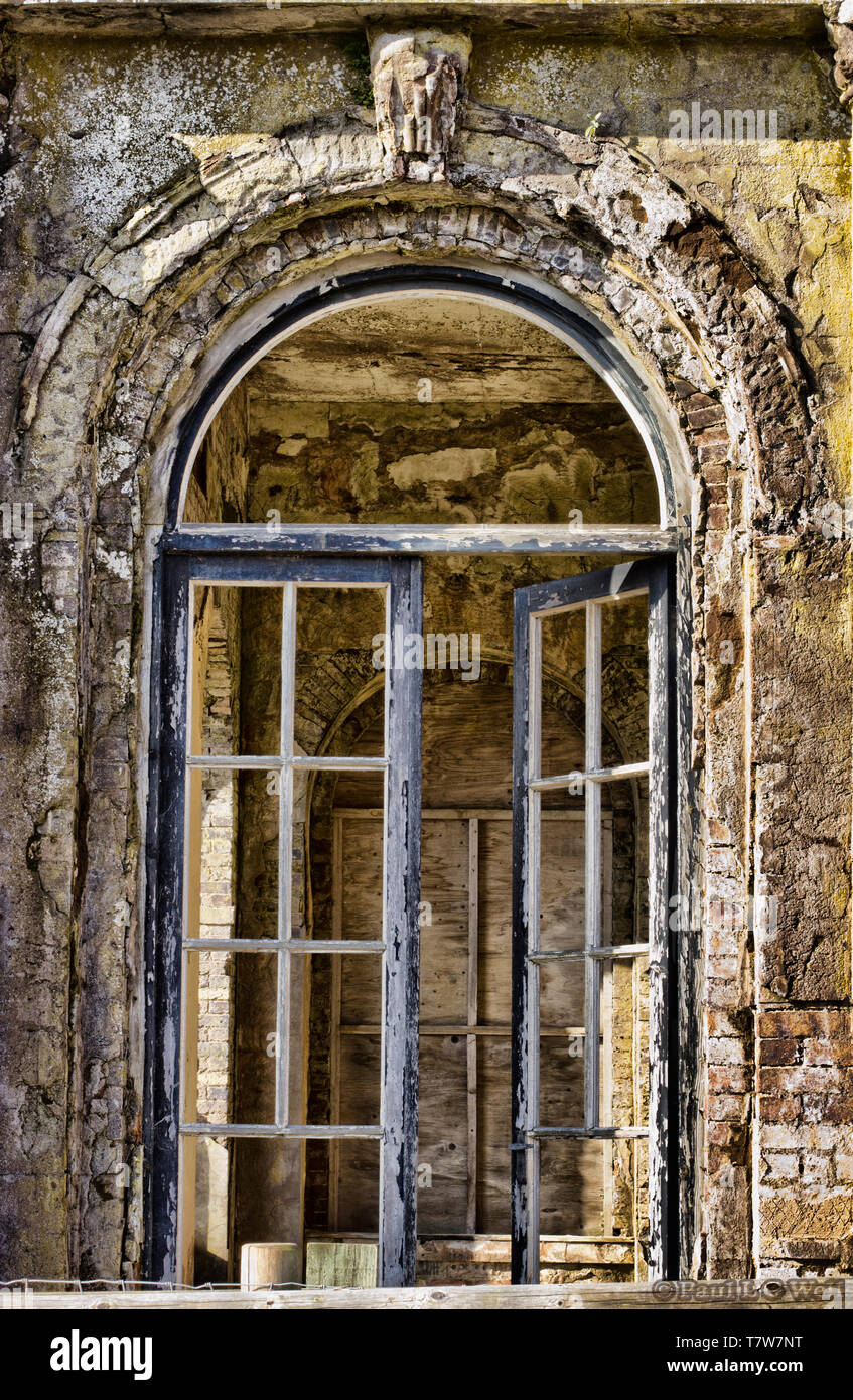 colour images showing detail of abandoned classic buildings including window frames, stone columns, decoration etc Stock Photo
