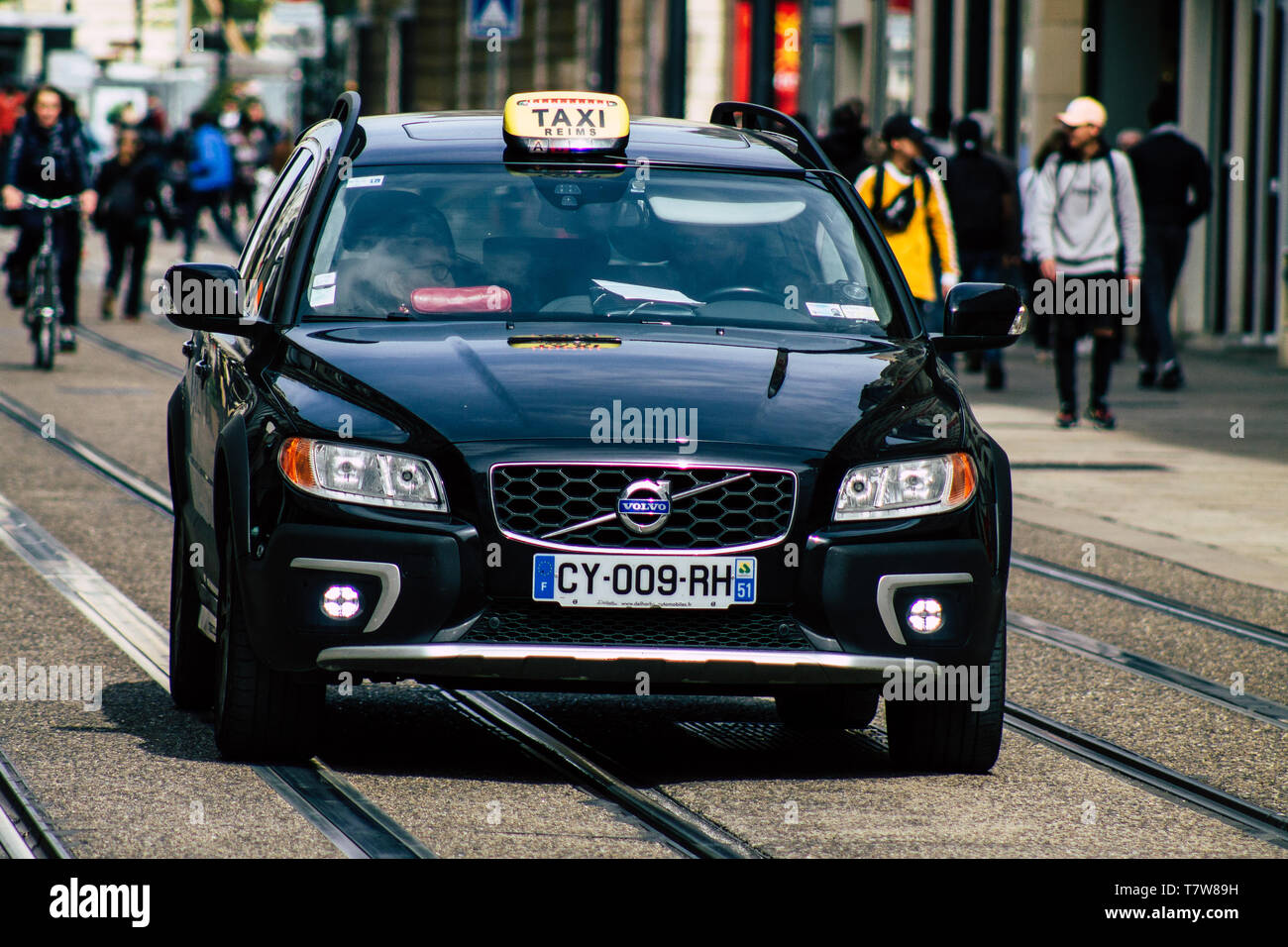 Reims France May 7, 2019 View of a traditional French taxi rolling in the city of Reims in