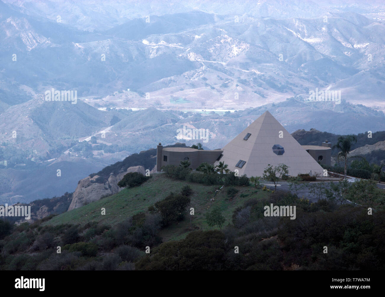 Pyramid shaped architectural house built on a mountain Stock Photo Alamy