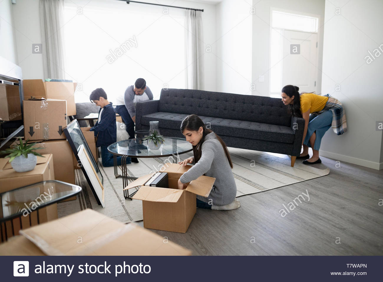 Family moving into new house Stock Photo Alamy