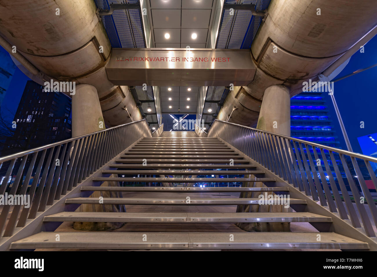 Beatrixkwartier (Beatrix district in Dutch) entrance east Escalator to a tramway station in The Hague at night Stock Photo