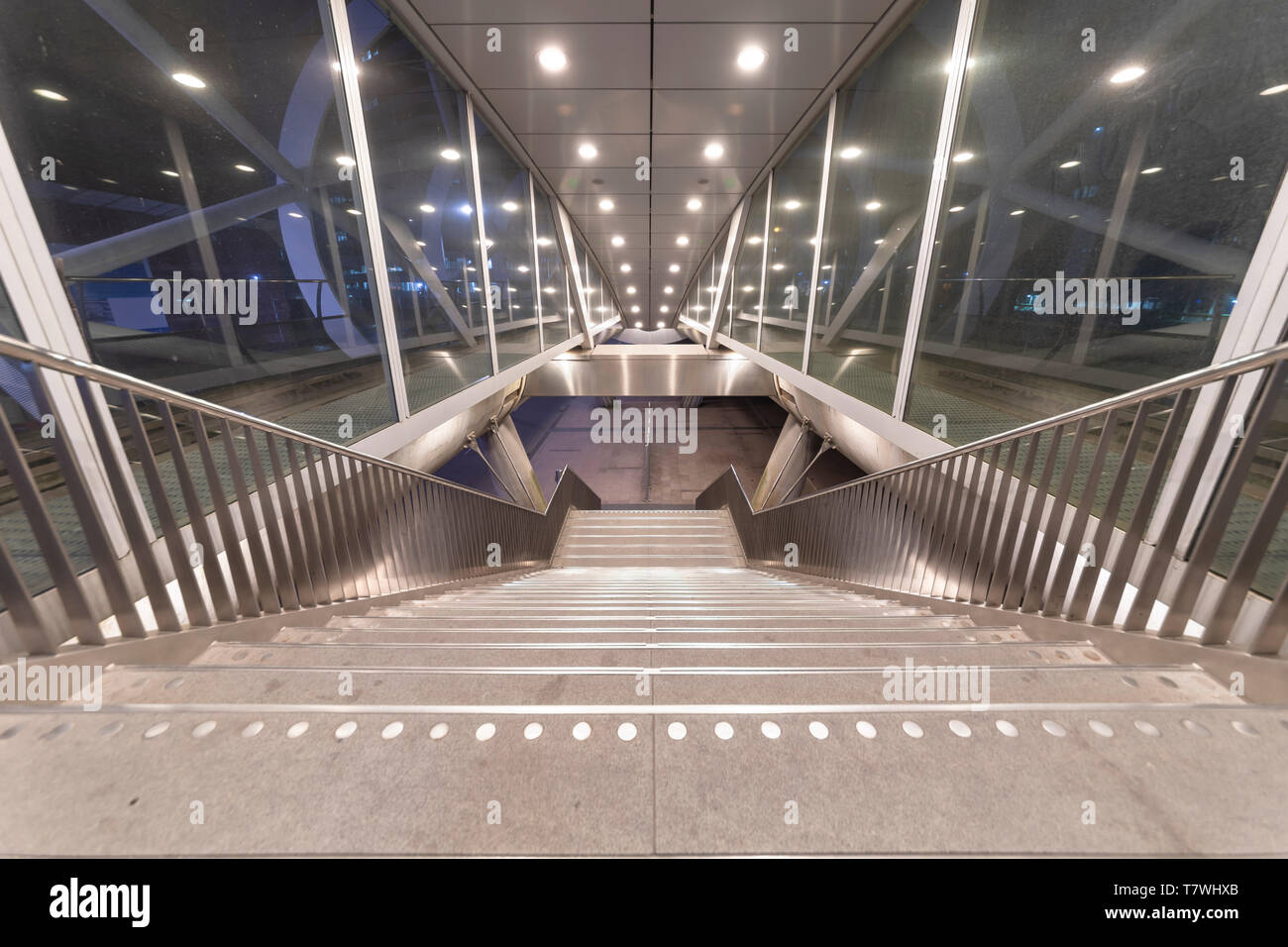 Beatrixkwartier (Beatrix district in Dutch) entrance East escalator getting out from tramway station in The Hague at night, Netherlands Stock Photo