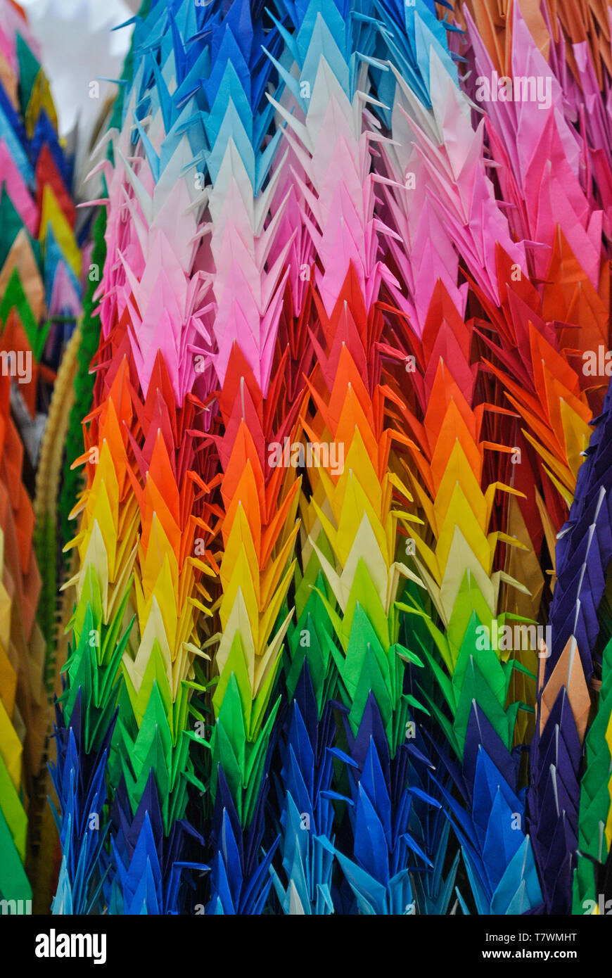 Origami, folded cranes.  People (mostly children) from around the world fold cranes and send them to Hiroshima where they are placed near the Children Stock Photo