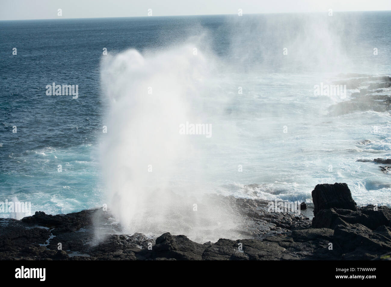 Blow hole on a Galapagos Island, the unique Islands in Pacific Ocean, home to Darwin theory of evolution Stock Photo