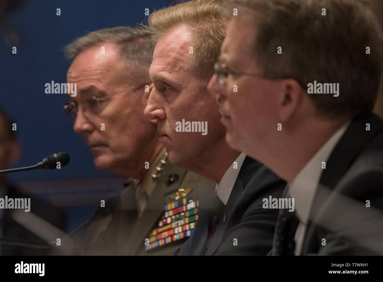 From left, the chairman of the Joint Chiefs of Staff, Marine Corps Gen. Joseph F. Dunford Jr., U.S. Acting Secretary of Defense Patrick M. Shanahan, and Under Secretary of Defense (Comptroller) / Chief Financial Officer David L. Norquist testify before the Senate Appropriations Defense Subcommittee on the fiscal year 2020 defense budget request, Washington, D.C., May 8, 2019. (DoD photo by Lisa Ferdinando) Stock Photo