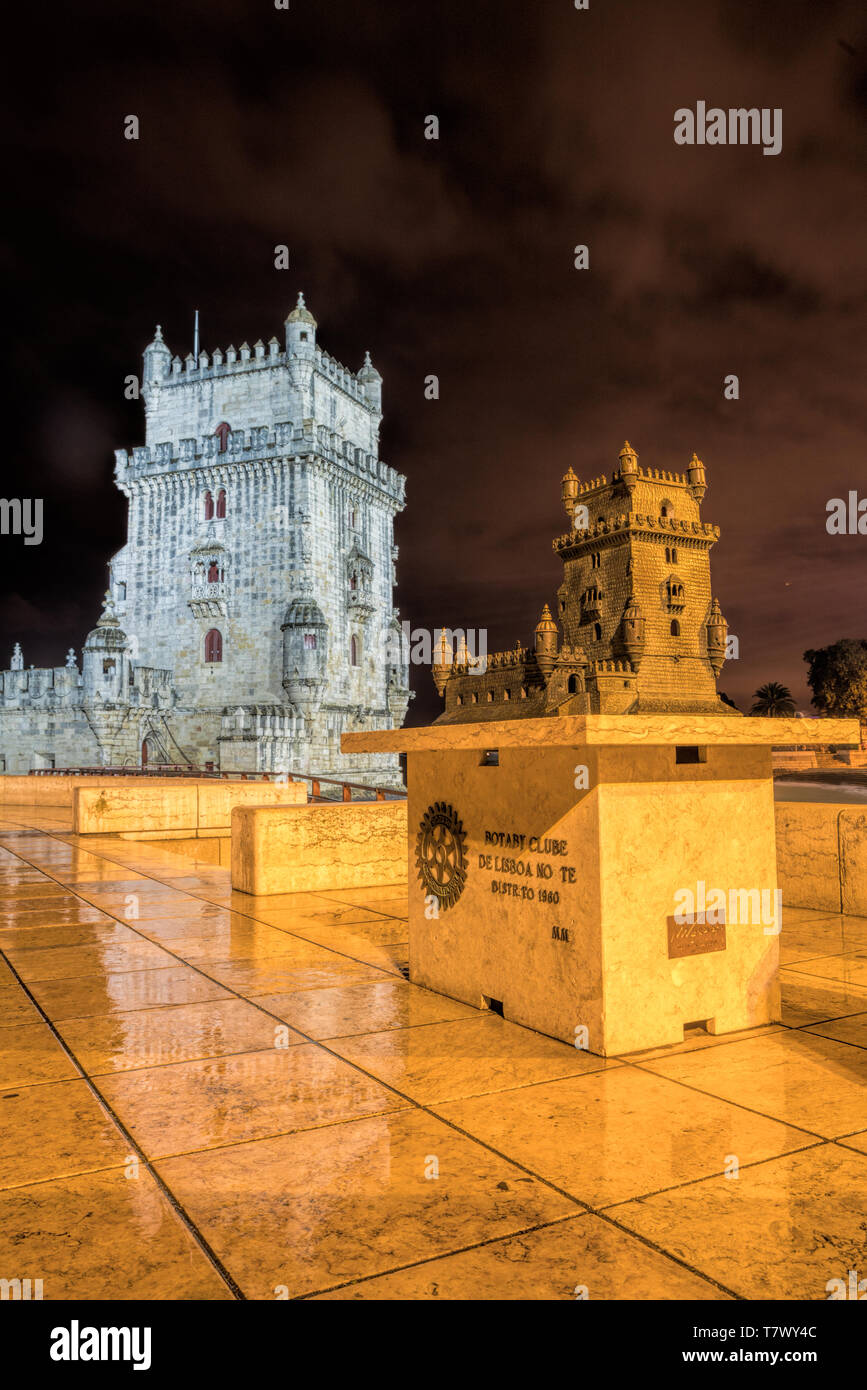 view of the illuminated Torre de Belem in Lisbon at night Stock Photo