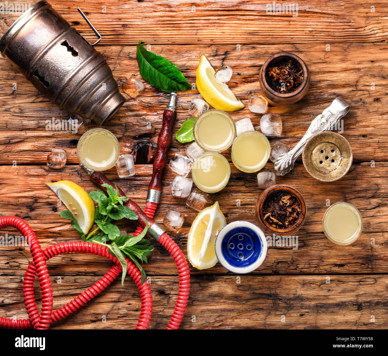 Smoking hookah and glasses with alcoholic limoncello.Oriental nargile Stock Photo Alamy