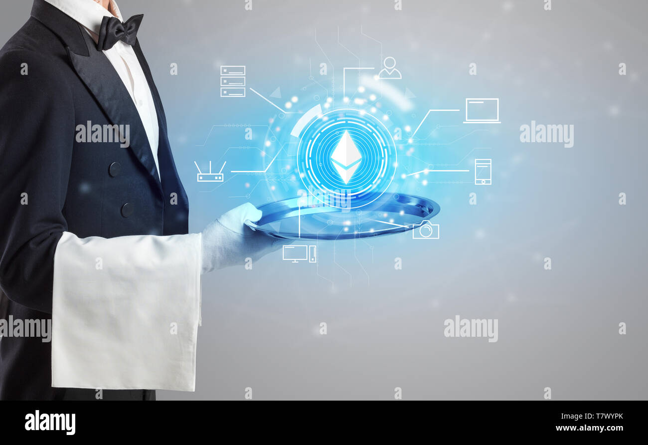 Waiter serving on a tray cryptocurrency and mining concept Stock Photo ...