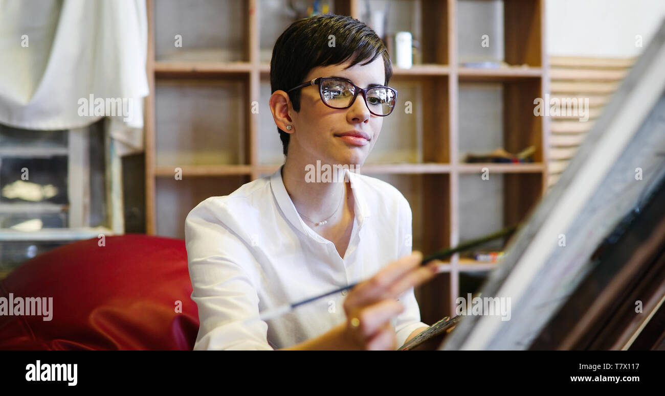 Female artist holding color palette hi-res stock photography and images ...