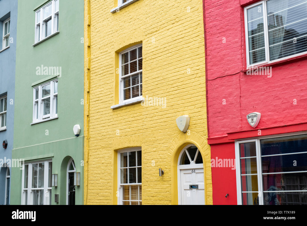 Colourful painted houses in Godfrey street, Chelsea, London, England