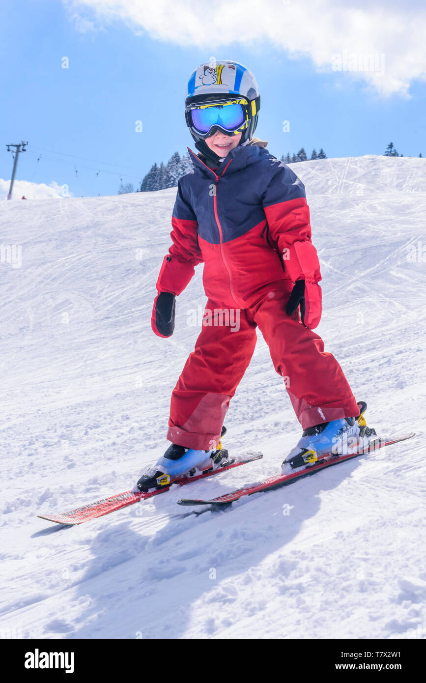 Cute little boy skiing on slope Stock Photo - Alamy