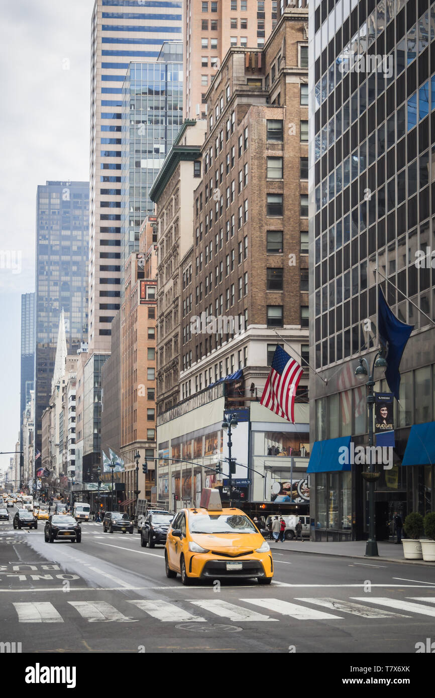 Yellow Cab and morning traffic on the streets of Manhattan in New York Stock Photo