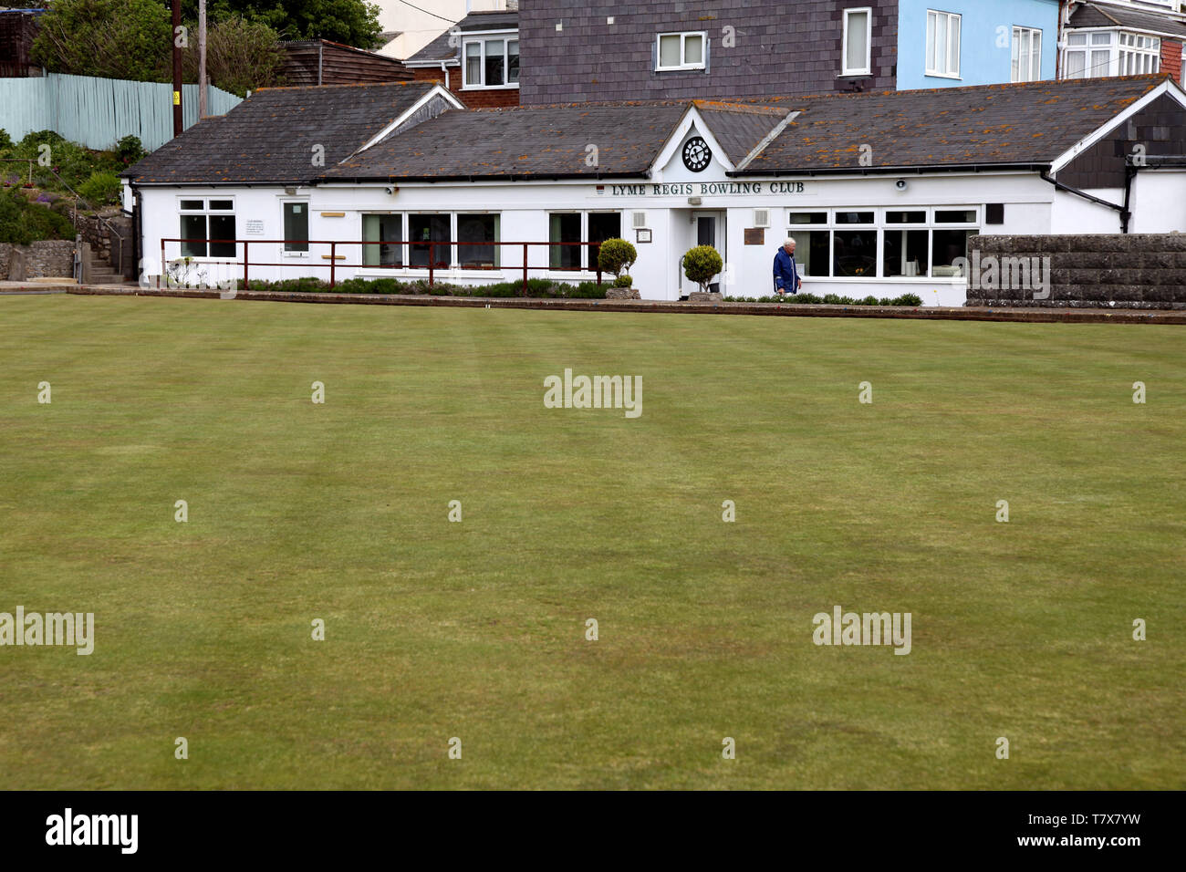Lyme Regis Bowling Club, Dorset, clubhouse viewed across lawn, 2019 with copy space Stock Photo
