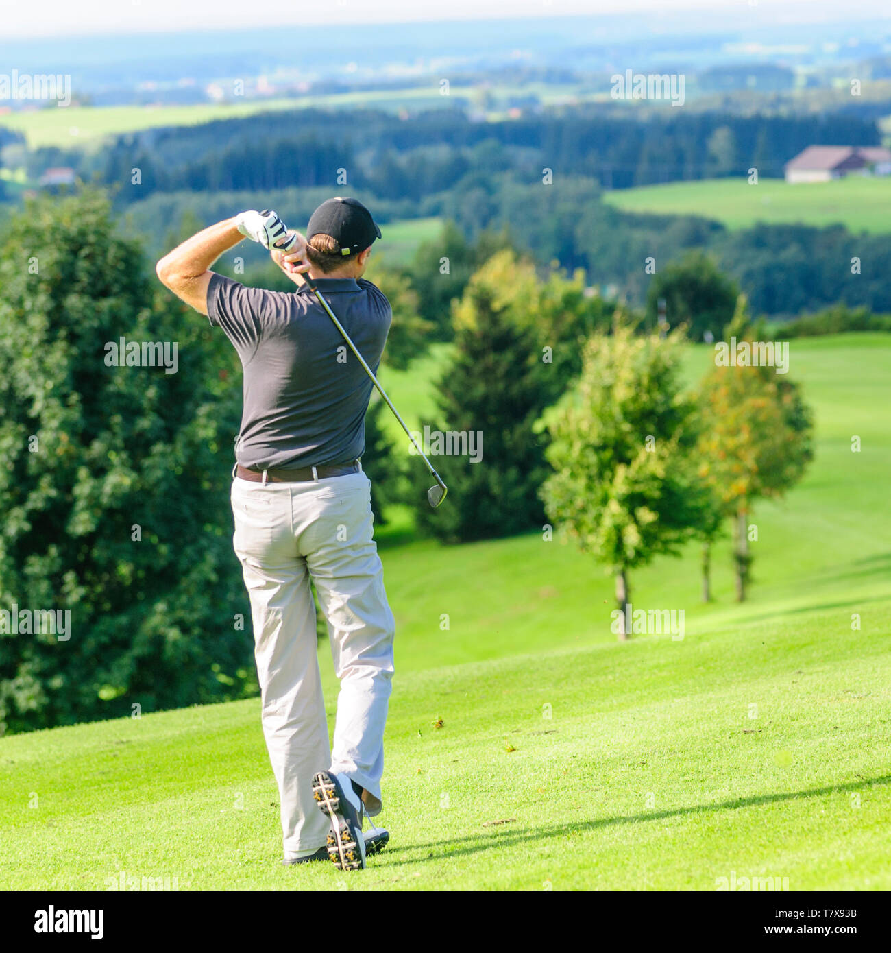 Couple playing golf Stock Photo